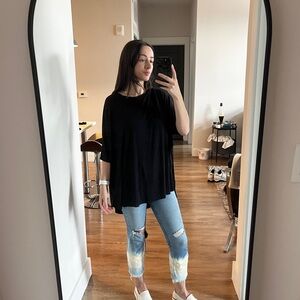 8•3•1 Black tunic with open sides